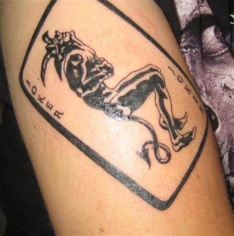 Значение татуировки джокера: знаки, символика и расшифровка